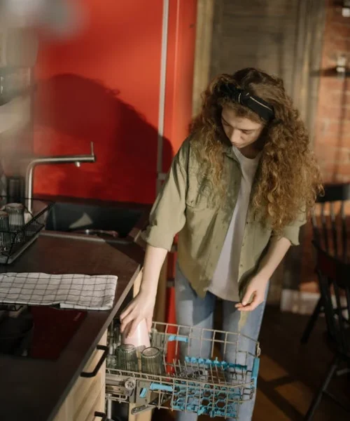 dishwasher repair service technician working