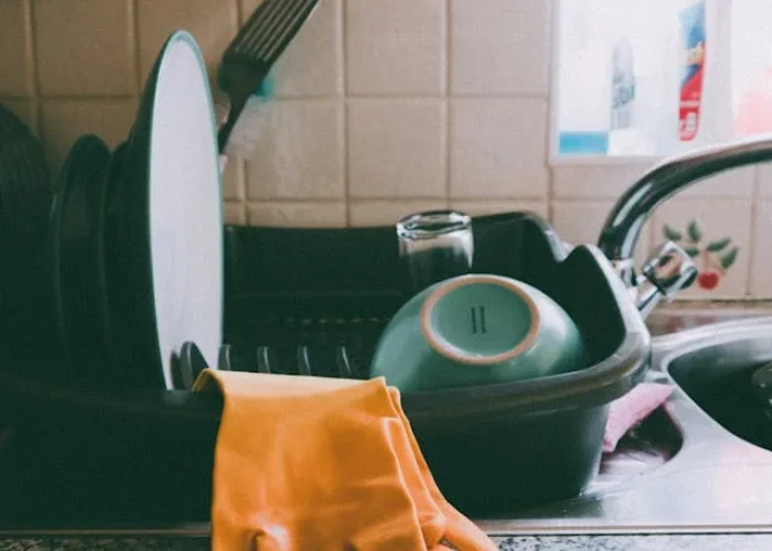 dishwasher repair service technician working