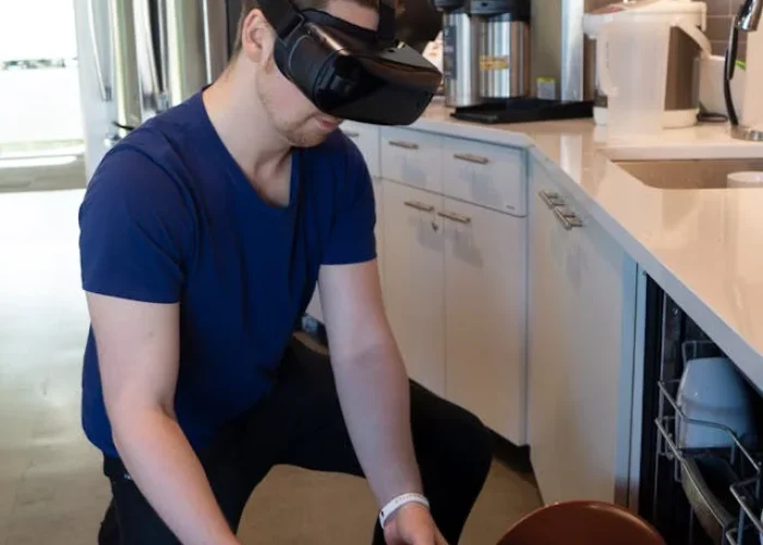 dishwasher repair service technician working