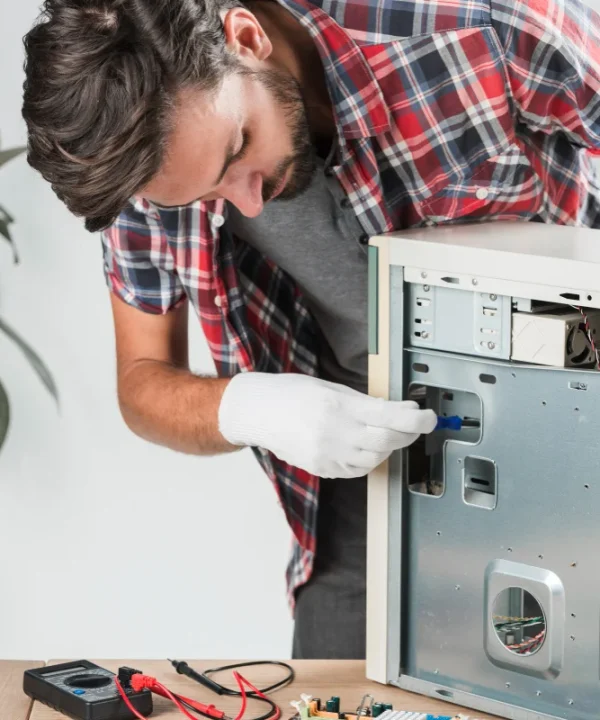 technician checking refrigerator compressor issue
