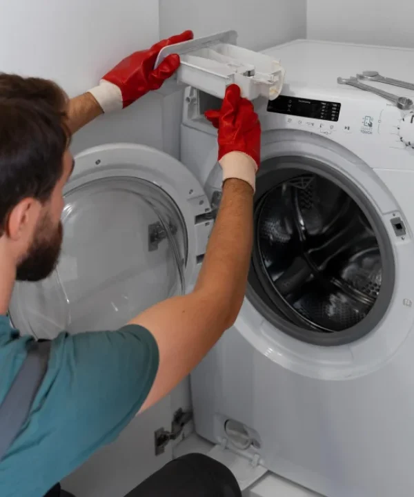 Washing machine repair service technician fixing washer in Naperville IL home appliance repair