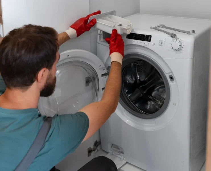 Washing machine repair service technician fixing washer in Naperville IL home appliance repair